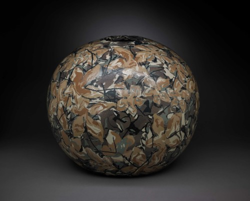 Vase-shaped ceramic with multi-colored clay body