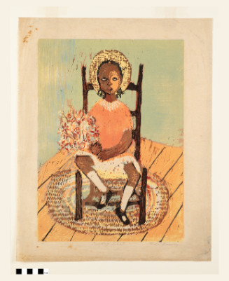 Young girl seated with proper right foot resting on chair leg-brace, she holds a bouquet of flowers in her right arm, she is wearing a hat that creates a halo shape around her head, the chair sits on an oval rug on a wood planked floor.