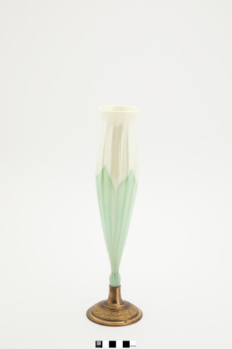 White and green Favrile glass stemmed vase with pulled feather decoration and metal base
