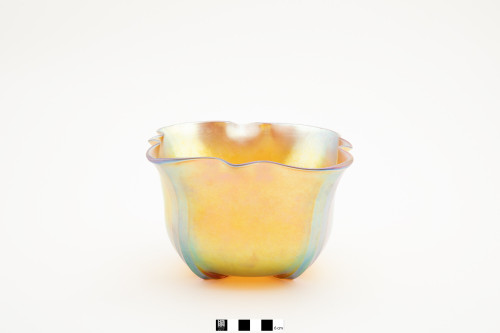 Gold Aurene bowl in a grotesque shape