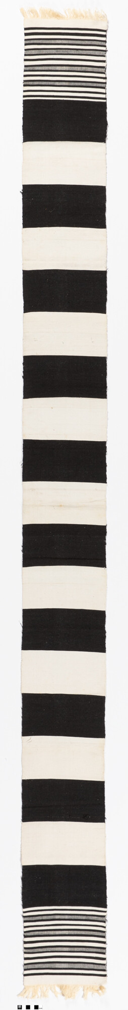 Strip woven, simple weave, black and white strips 8" wide.