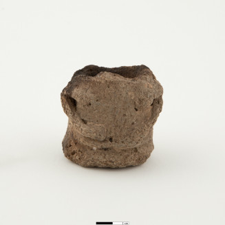 Zapatero ware, appliqued arm, body, incised. Ceramic body fragment of female figure - roughly cylindrical with flat bottom, broken at top/shoulder area - thin tubular arms with hands placed on abdomen - small mounds for breasts.