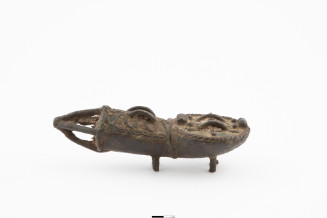 Object with abstracted geometric forms, and four legs.
